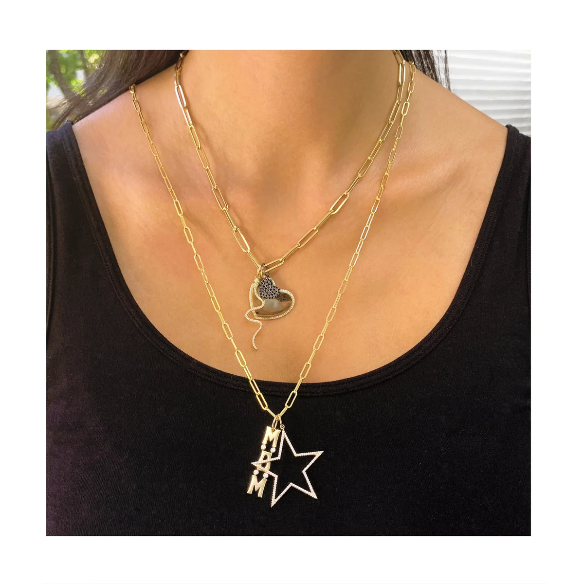 Black diamond heart charm