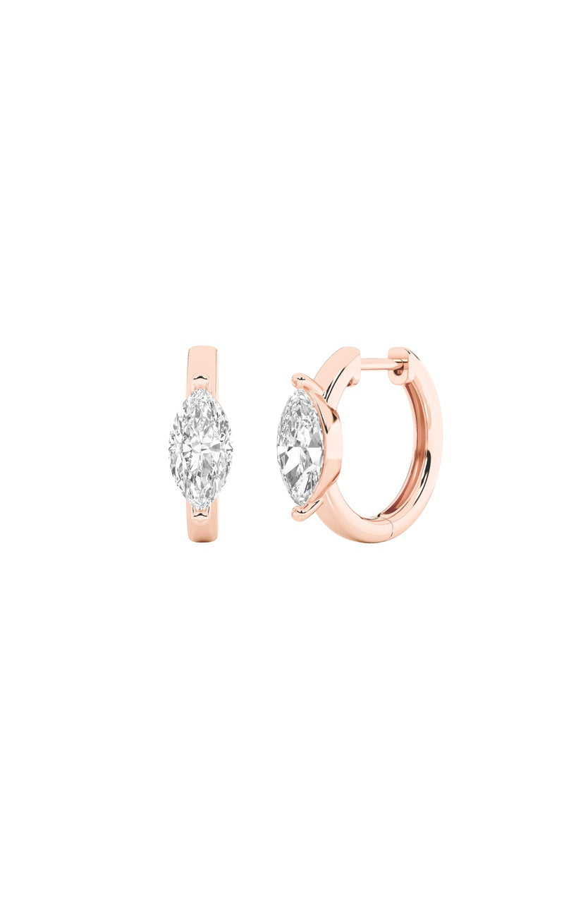 Vs) solitaire huggie earrings in 14k gold