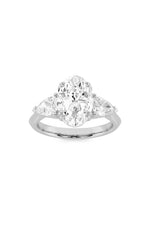 Load image into Gallery viewer, 3CTW Oval Shaped Lab Grown Diamond (F/VS) Three Stone Hidden Halo Ring in 14K Gold
