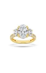 Load image into Gallery viewer, 5CTW Oval Shaped Lab Grown Diamond (F/VS) Three Stone Accented Engagement Ring in 14K Gold
