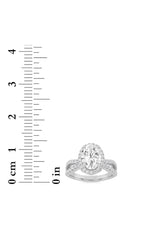 Load image into Gallery viewer, 2CTW Oval Shaped Lab Grown Diamond (F/VS) Split Shank Halo Accented Engagement Ring in 14K Gold
