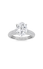 Load image into Gallery viewer, 1.5CTW Oval Shaped Lab Grown Diamond (F/VS) Hidden Halo Accented Engagement Ring in 14K Gold
