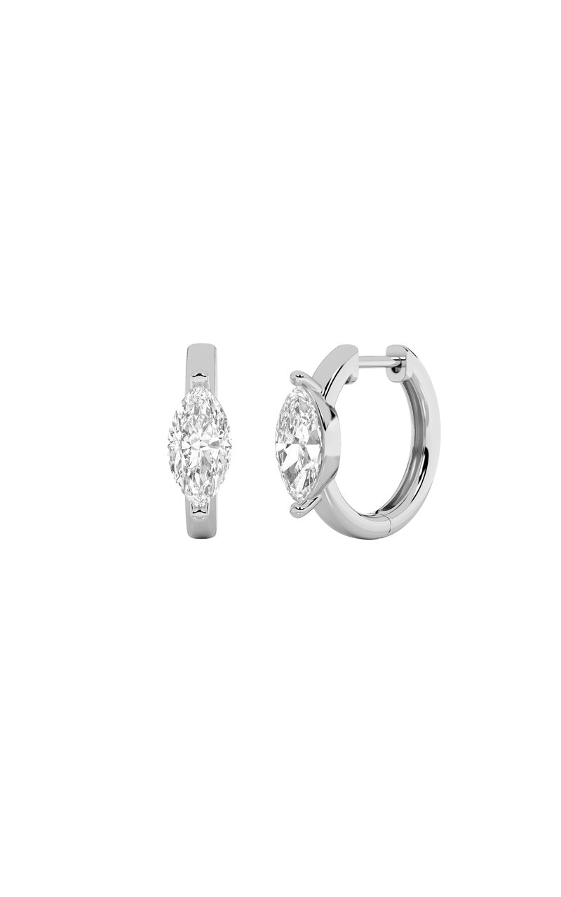 Vs) solitaire huggie earrings in 14k gold