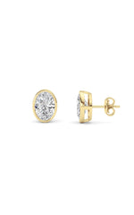 Load image into Gallery viewer, 4CTW Oval Shaped Lab Grown Diamond (F/VS) Bezel Set Stud Earrings in 14K Gold
